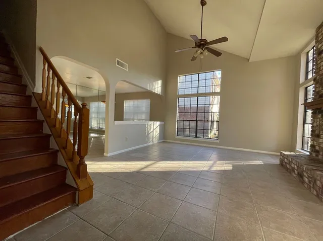 a view of entryway and hall with a window