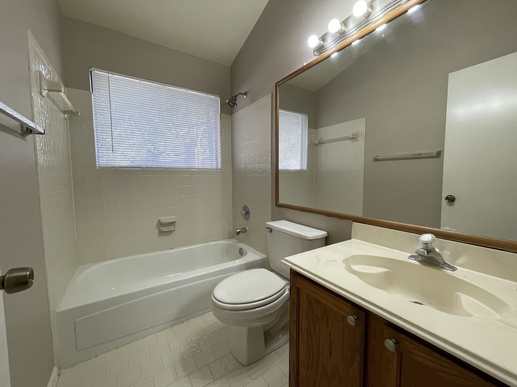 88 West Rainbow Ridge Circle The Woodlands, TX 77381 - Photo 15 of 16 a bathroom with a sink a toilet and shower