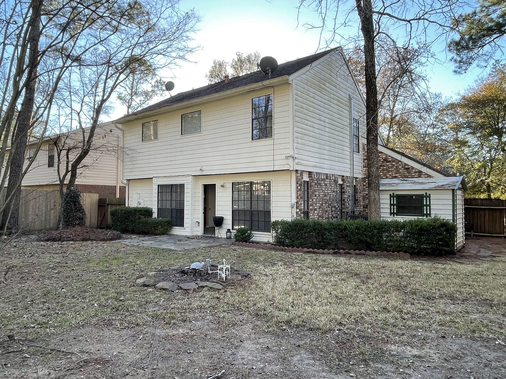 88 West Rainbow Ridge Circle The Woodlands, TX 77381 - Photo 16 of 16 a front view of a house with a yard