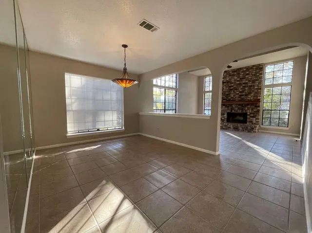 a view of livingroom with window and hardwood floor
