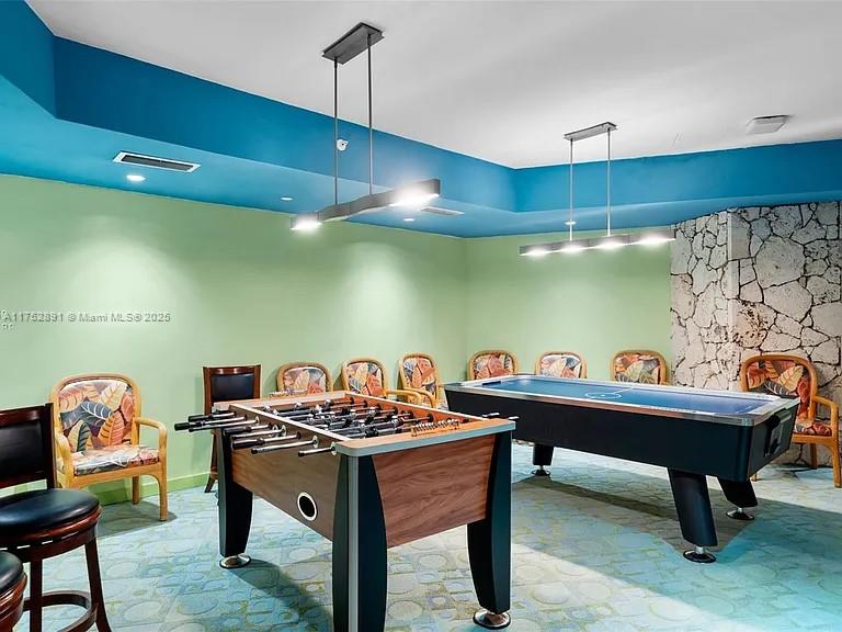 1121 Crandon Boulevard, Unit E203 Key Biscayne, FL 33149 - Photo 18 of 22 a view of a room with furniture and toys