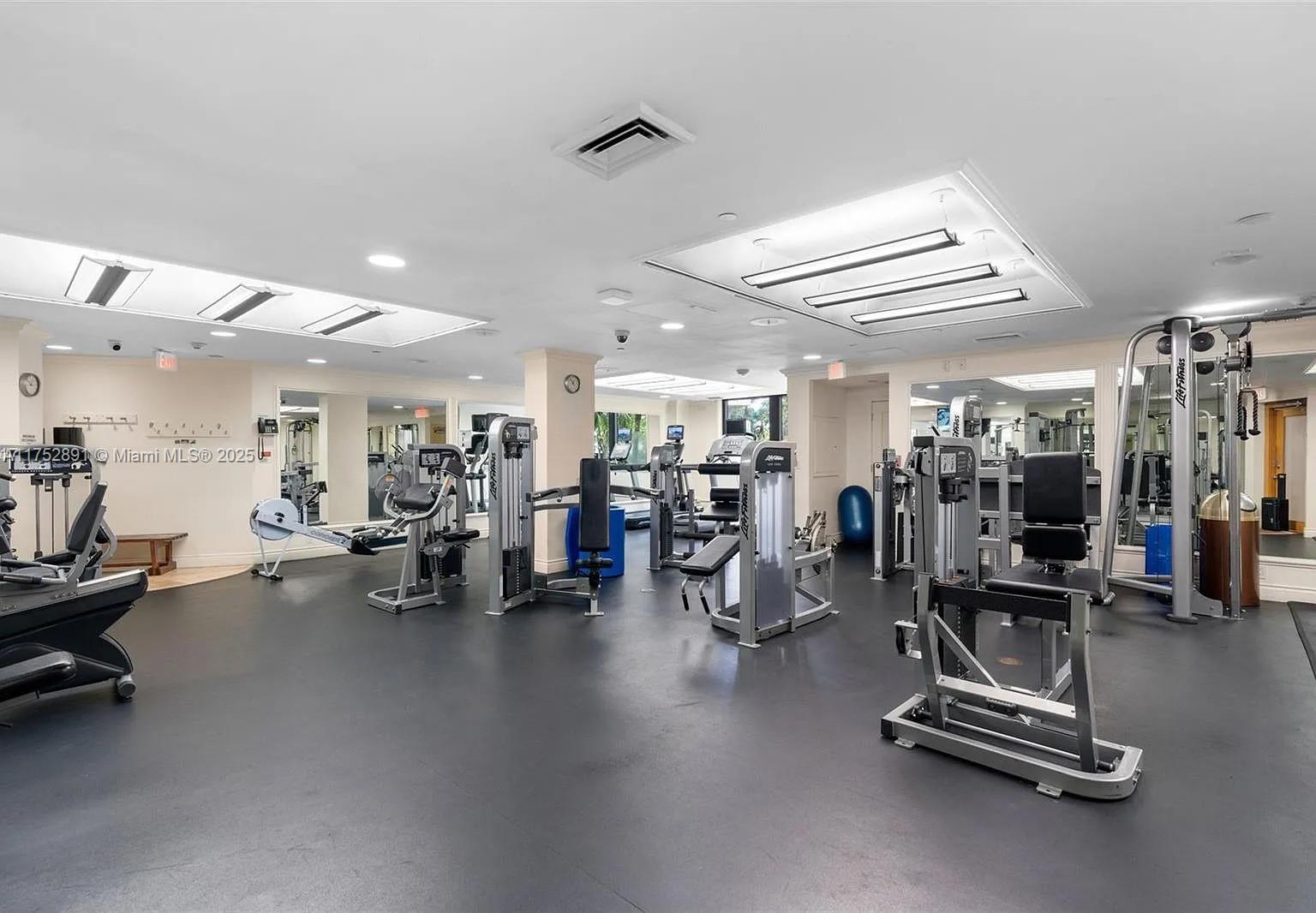 1121 Crandon Boulevard, Unit E203 Key Biscayne, FL 33149 - Photo 21 of 22 a view of a room with gym equipment