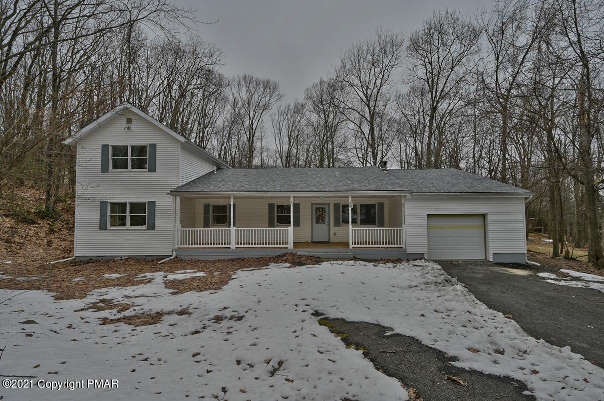 26 Seneca Road Mount Pocono, PA 18344 - Photo 54 of 62 front view of a house with a yard