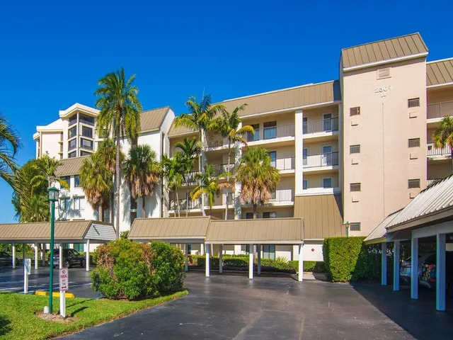 a view of a building with a yard
