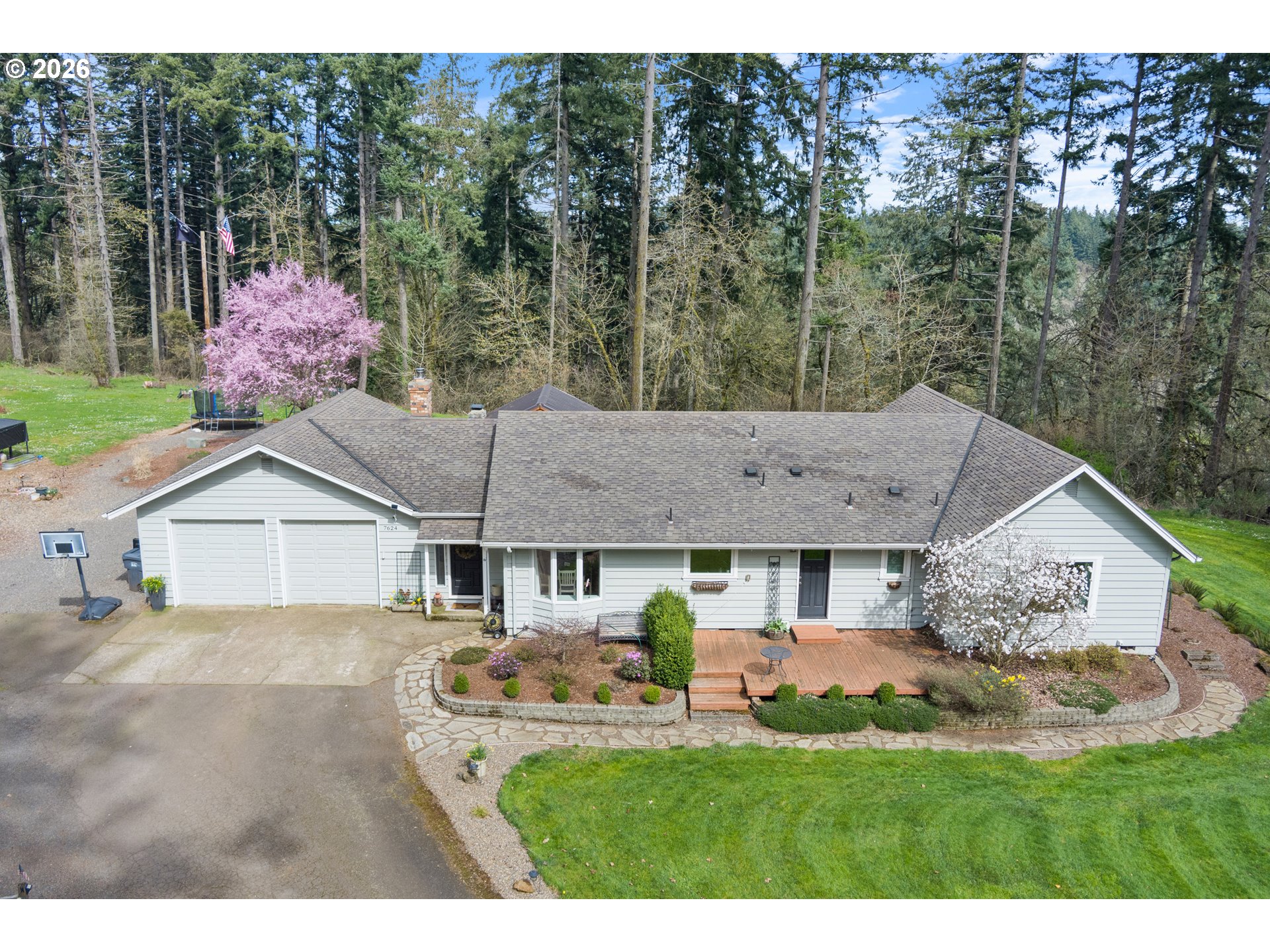 7624 Shady Way Southeast Turner, OR 97392 - Photo 1 of 48 a front view of a house with a yard and garage