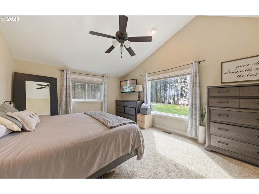 7624 Shady Way Southeast Turner, OR 97392 - Photo 19 of 48 a bedroom with a bed and a large window