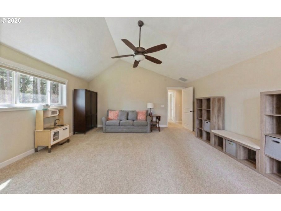 7624 Shady Way Southeast Turner, OR 97392 - Photo 23 of 48 a living room with furniture and a ceiling fan