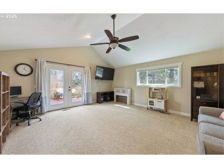 7624 Shady Way Southeast Turner, OR 97392 - Photo 24 of 48 a living room with furniture a ceiling fan and a window