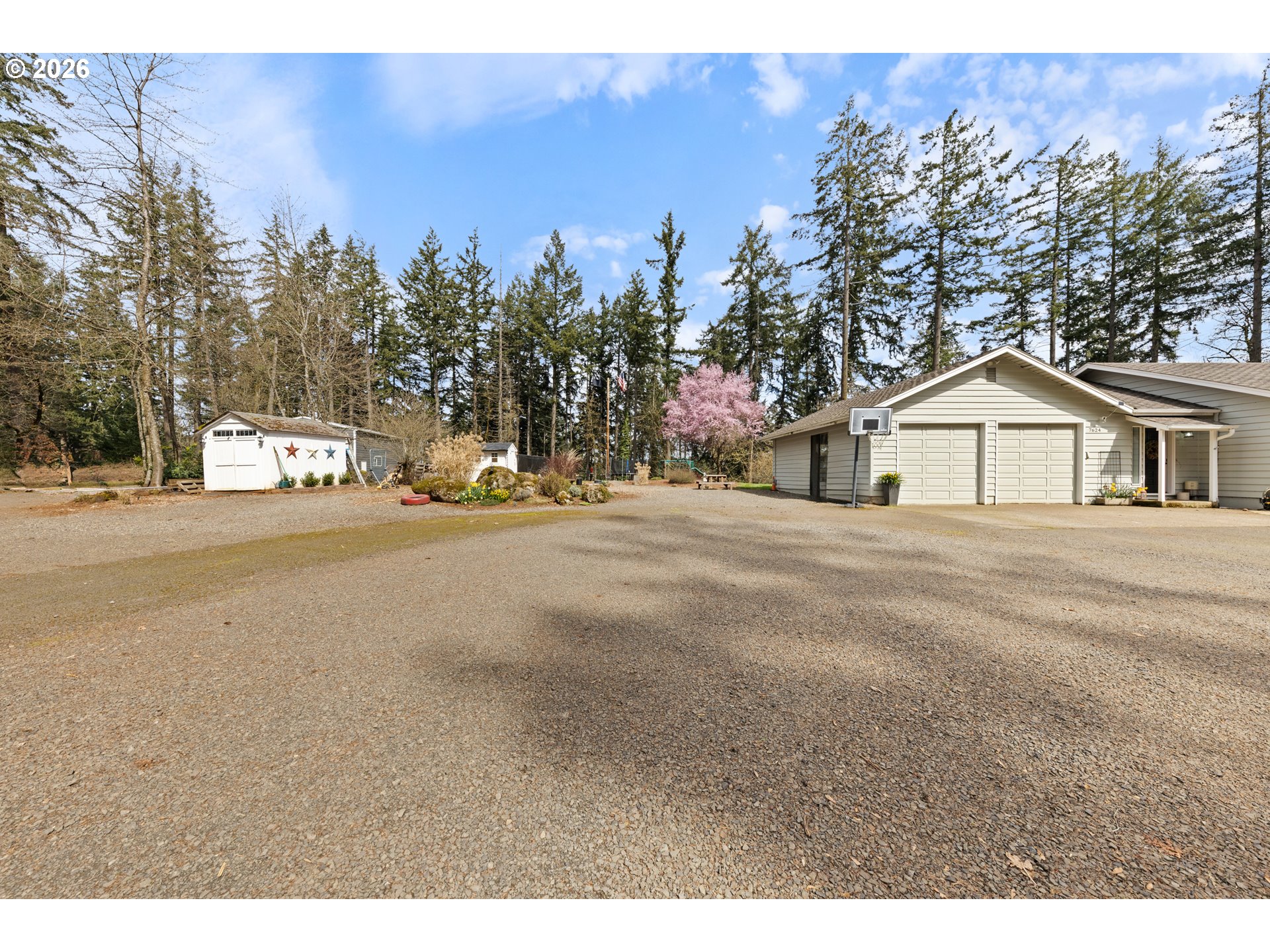 7624 Shady Way Southeast Turner, OR 97392 - Photo 4 of 48 a view of a house with trees in the background
