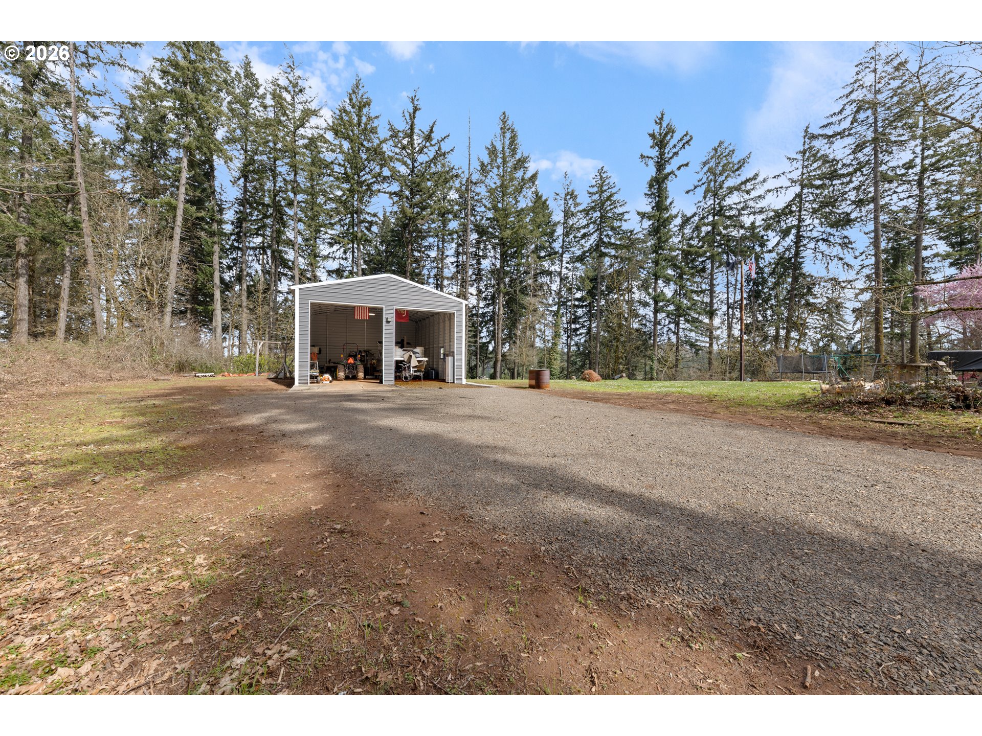 7624 Shady Way Southeast Turner, OR 97392 - Photo 45 of 48 a front view of a house with a yard and trees