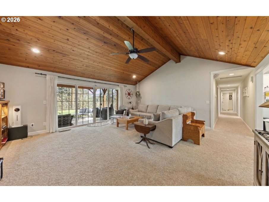 7624 Shady Way Southeast Turner, OR 97392 - Photo 6 of 48 a living room with furniture and a large window