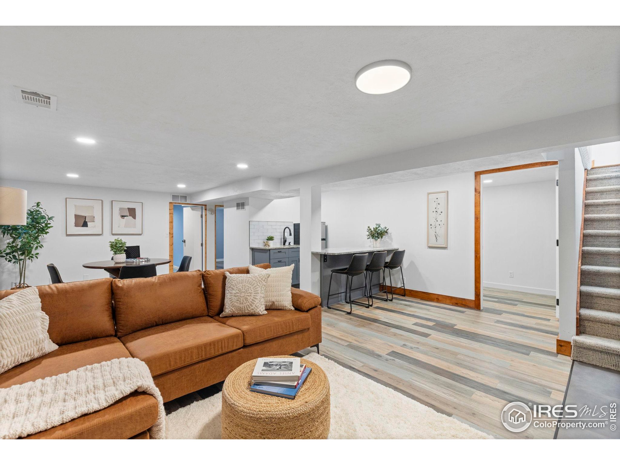 7238 Mt Sherman Road Longmont, CO 80503 - Photo 25 of 48 a living room with furniture and a table