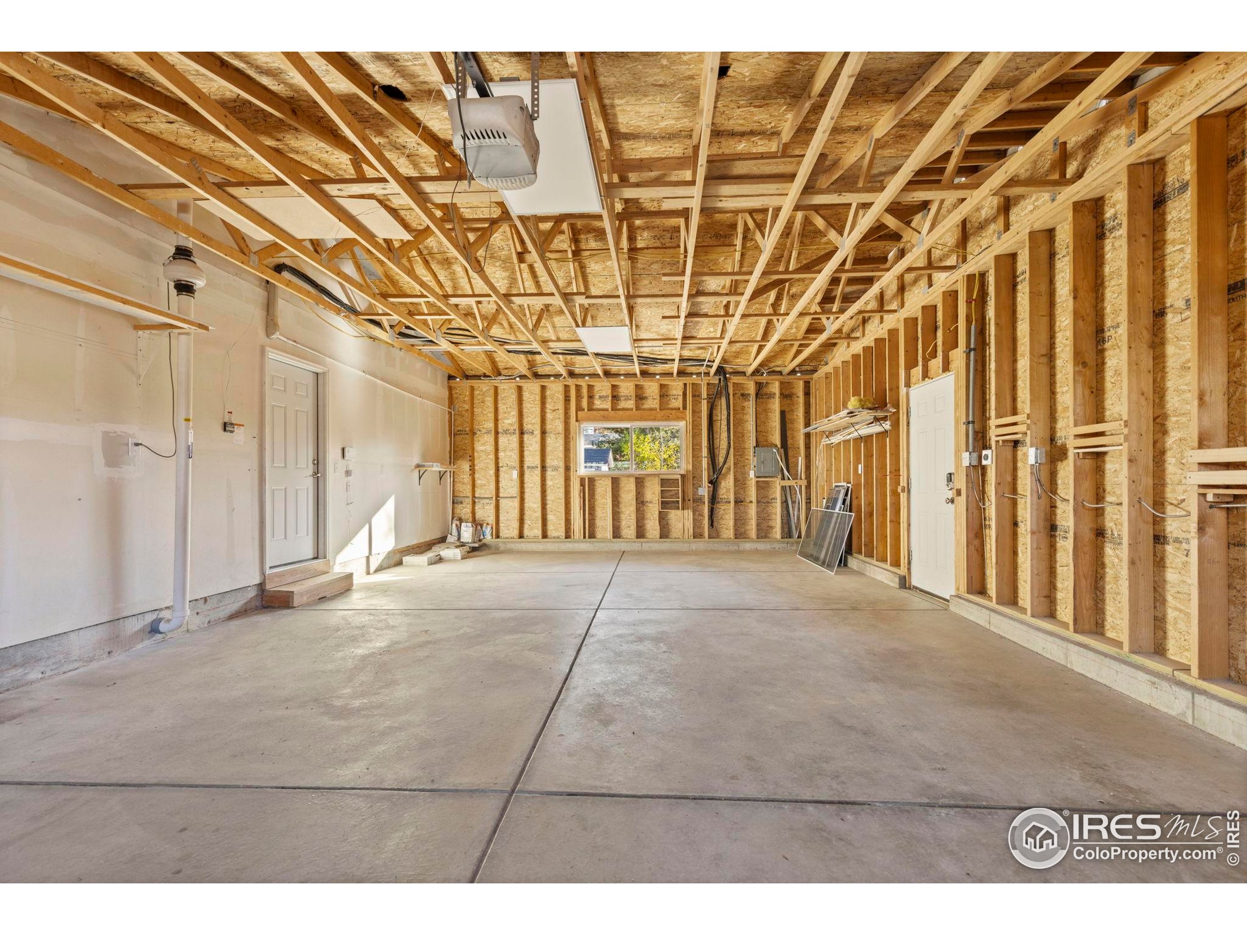 7238 Mt Sherman Road Longmont, CO 80503 - Photo 32 of 48 a view of a room with wooden walls