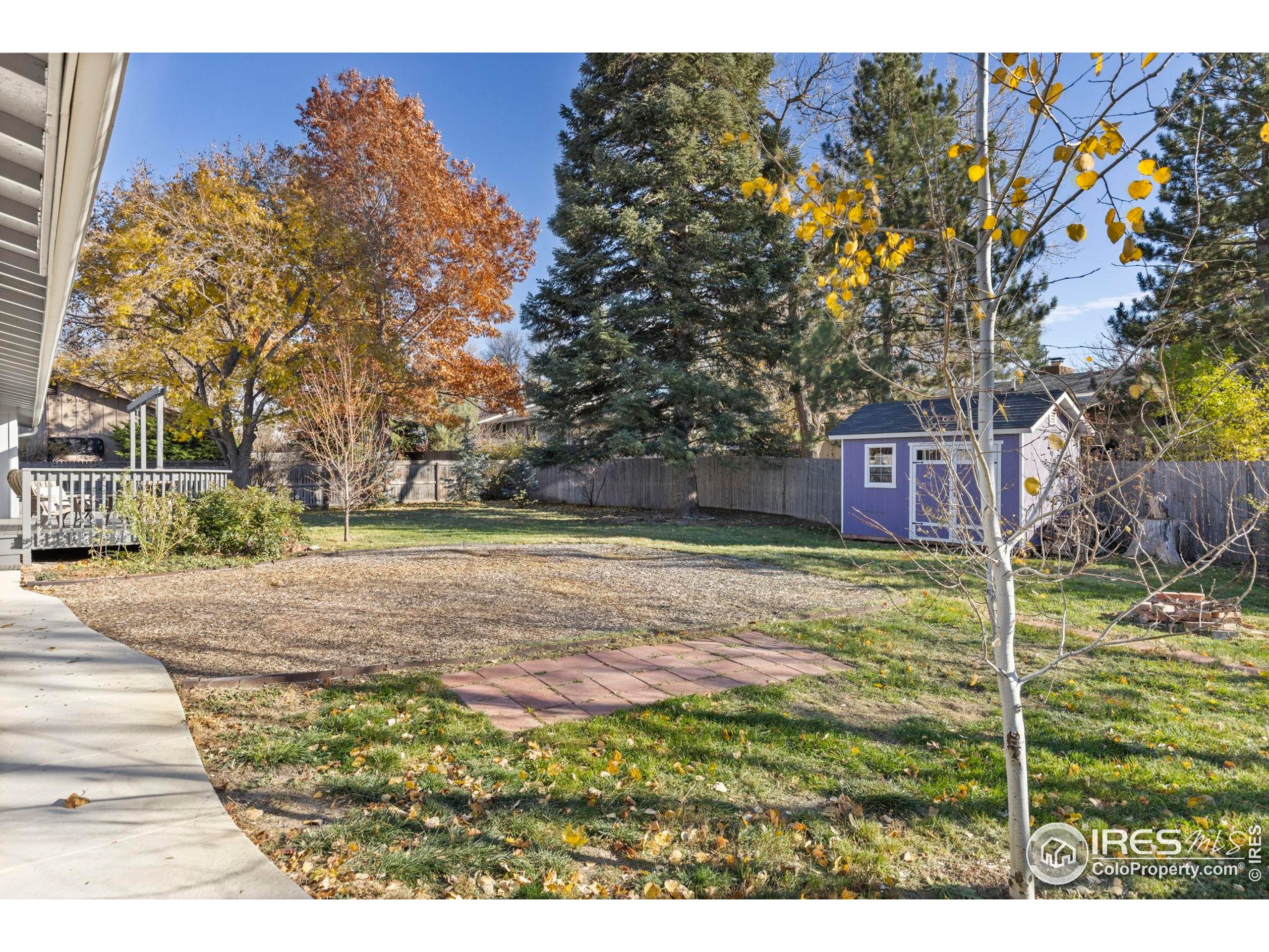7238 Mt Sherman Road Longmont, CO 80503 - Photo 38 of 48 a view of a yard with an trees