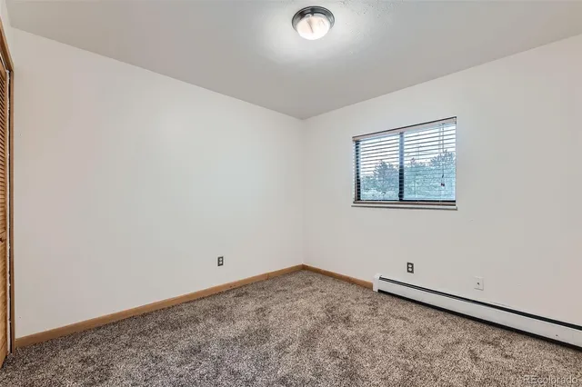 an empty room with a workbench