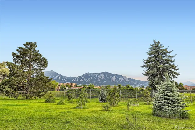 a view of lake with mountain in the background