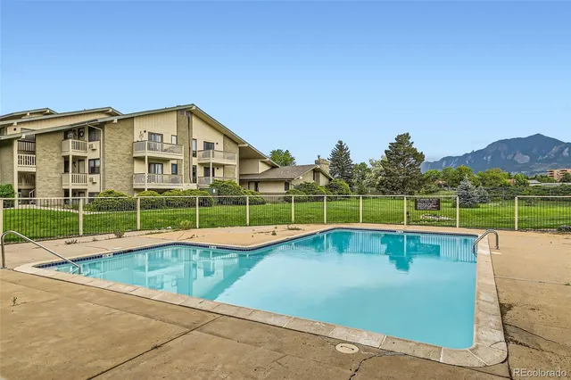 a view of a house with a swimming pool
