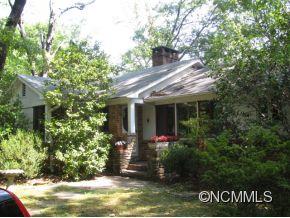 390 Sourwood Ridge Road Tryon, NC 28782 - Photo 1 of 6 a view of house with tree s