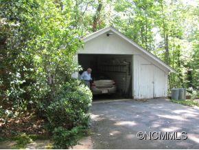 390 Sourwood Ridge Road Tryon, NC 28782 - Photo 6 of 6 a house with a outdoor space