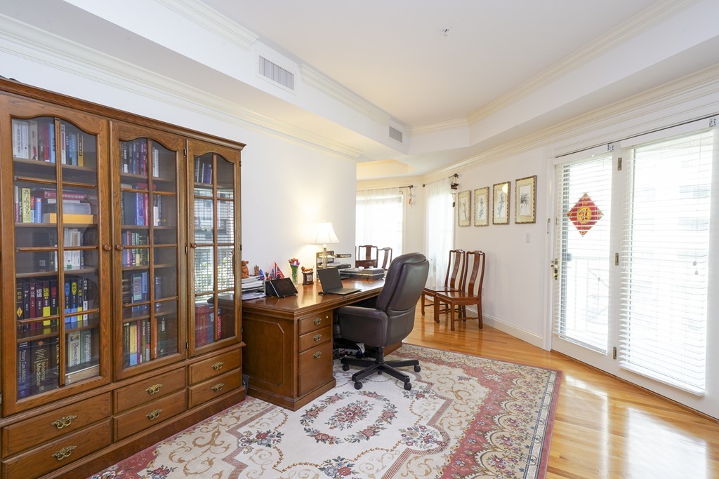 75 Winchester Street, Unit 301 Brookline, MA 02446 - Photo 6 of 8 a view of a workspace with furniture and a window