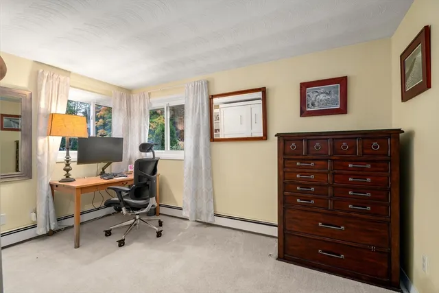 a view of a workspace with furniture