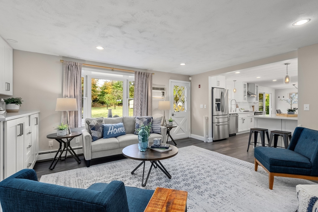 62 Gregory Road Framingham, MA 01701 - Photo 32 of 42 a living room with furniture and a large window