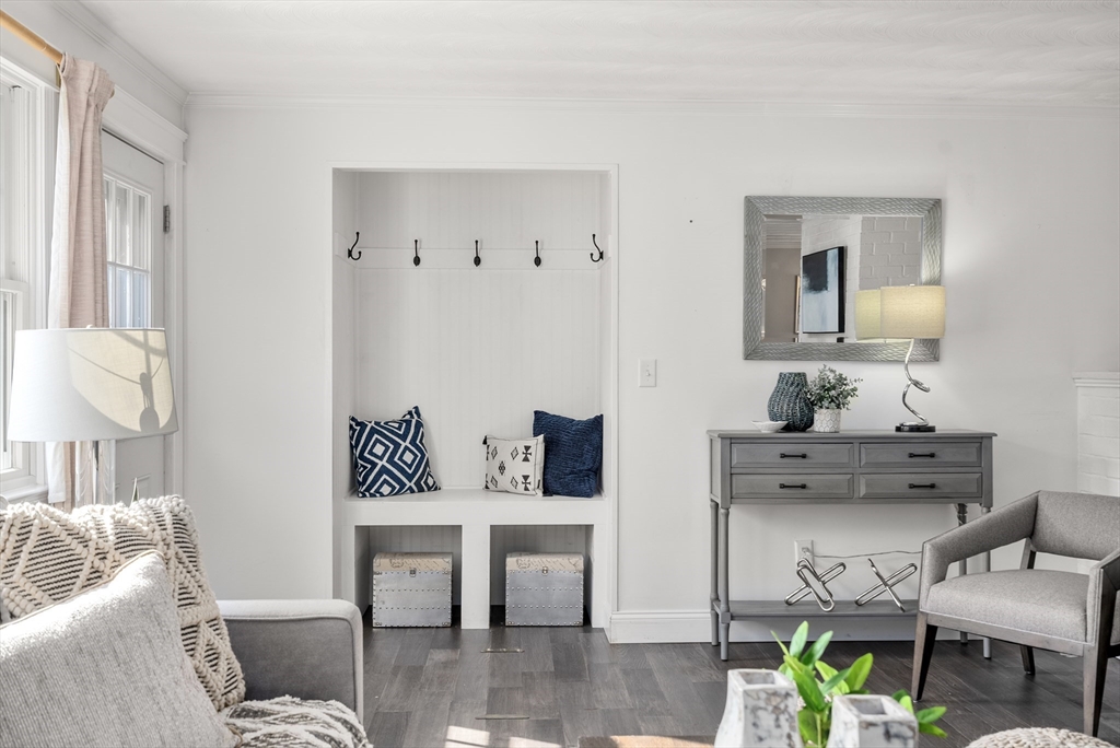62 Gregory Road Framingham, MA 01701 - Photo 37 of 42 a living room with furniture and a lamp