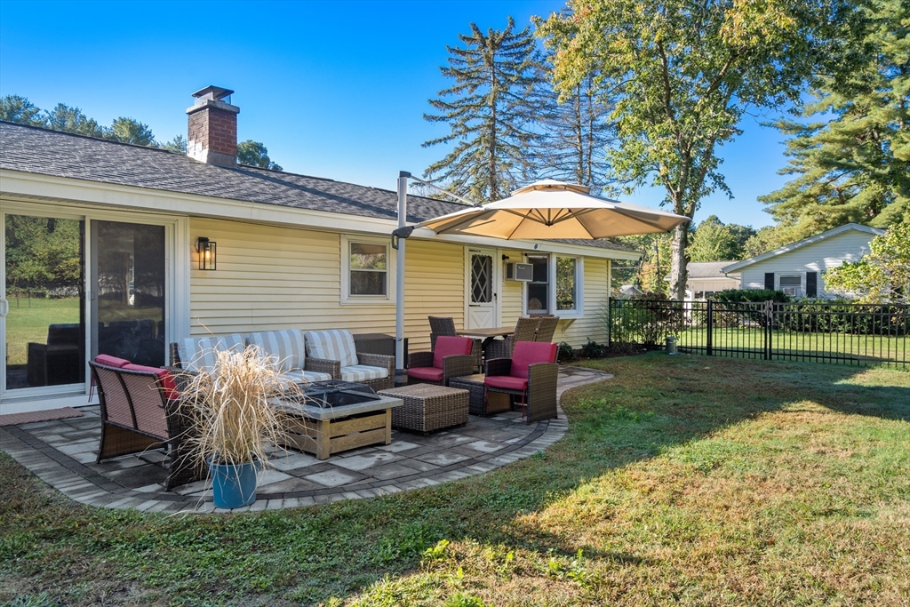 62 Gregory Road Framingham, MA 01701 - Photo 42 of 42 a view of a house with a backyard and sitting area