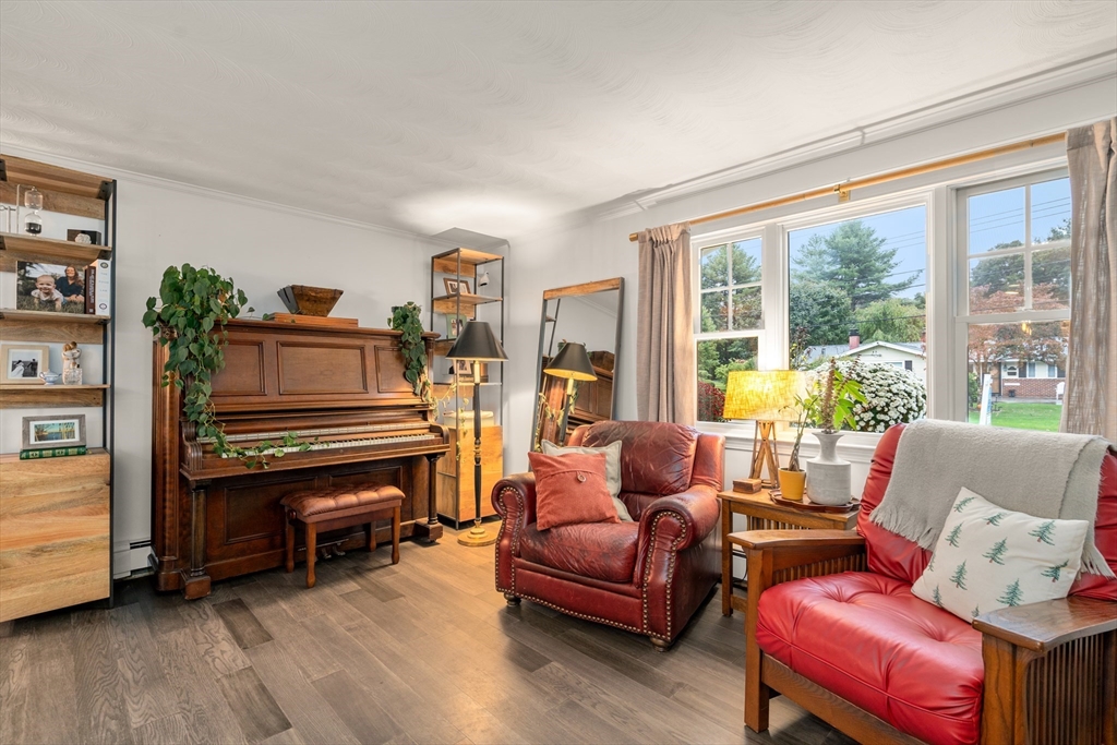 62 Gregory Road Framingham, MA 01701 - Photo 5 of 42 a living room with furniture and a window