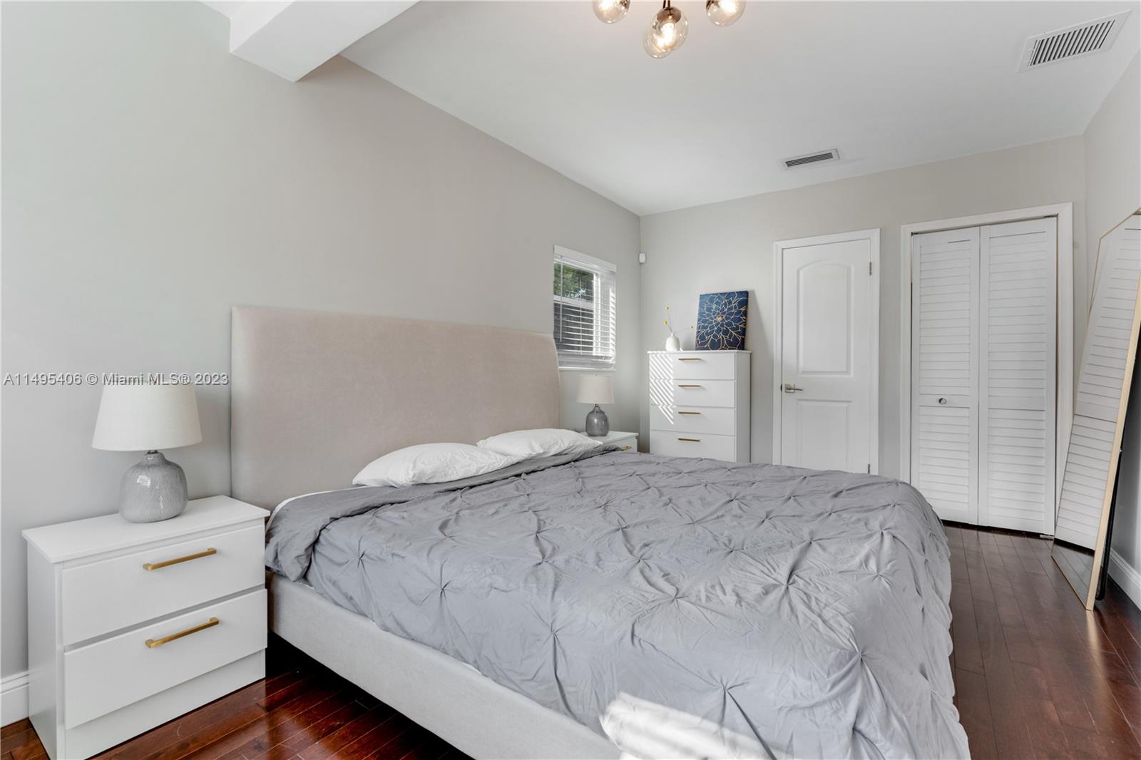 2465 Southwest 21st Terrace Miami, FL 33145 - Photo 18 of 45 a bedroom with a bed and a closet