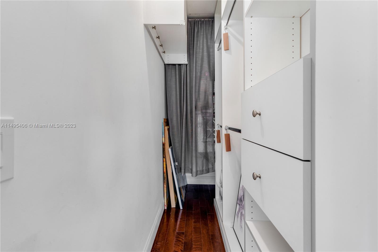 2465 Southwest 21st Terrace Miami, FL 33145 - Photo 22 of 45 a view of a hallway with wooden floor and staircase
