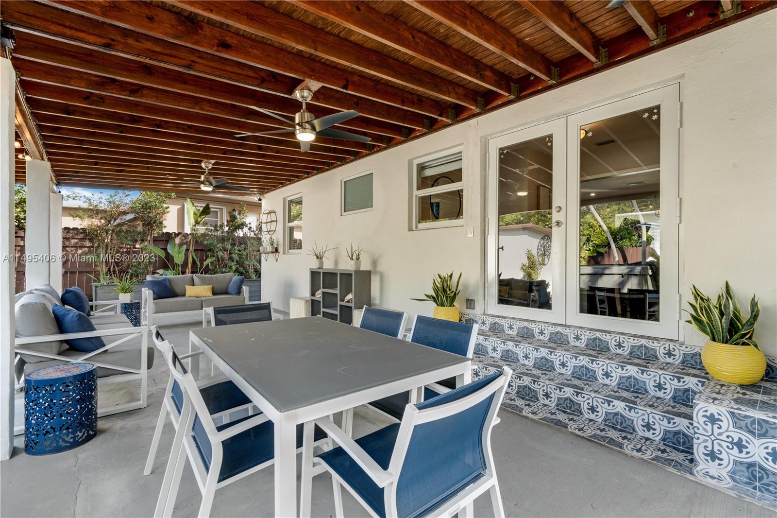 2465 Southwest 21st Terrace Miami, FL 33145 - Photo 28 of 45 a outdoor dining space with furniture and potted plants