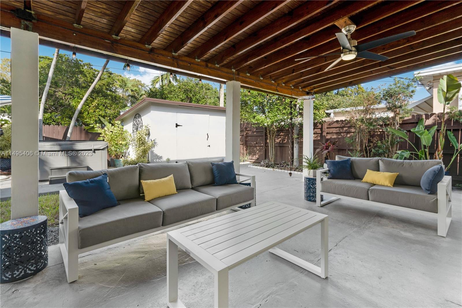 2465 Southwest 21st Terrace Miami, FL 33145 - Photo 30 of 45 a outdoor living space with furniture and garden view