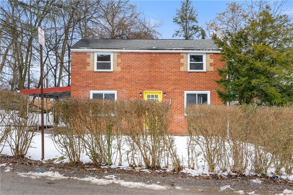2041 Lindsay Road Pittsburgh, PA 15221 - Photo 2 of 24 a front view of a house with a yard