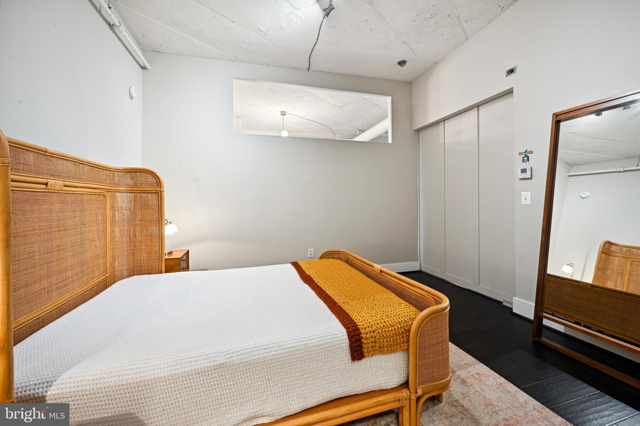 1700 Kalorama Road Northwest, Unit 207 Washington, DC 20009 - Photo 15 of 40 a bedroom with a bed and a desk