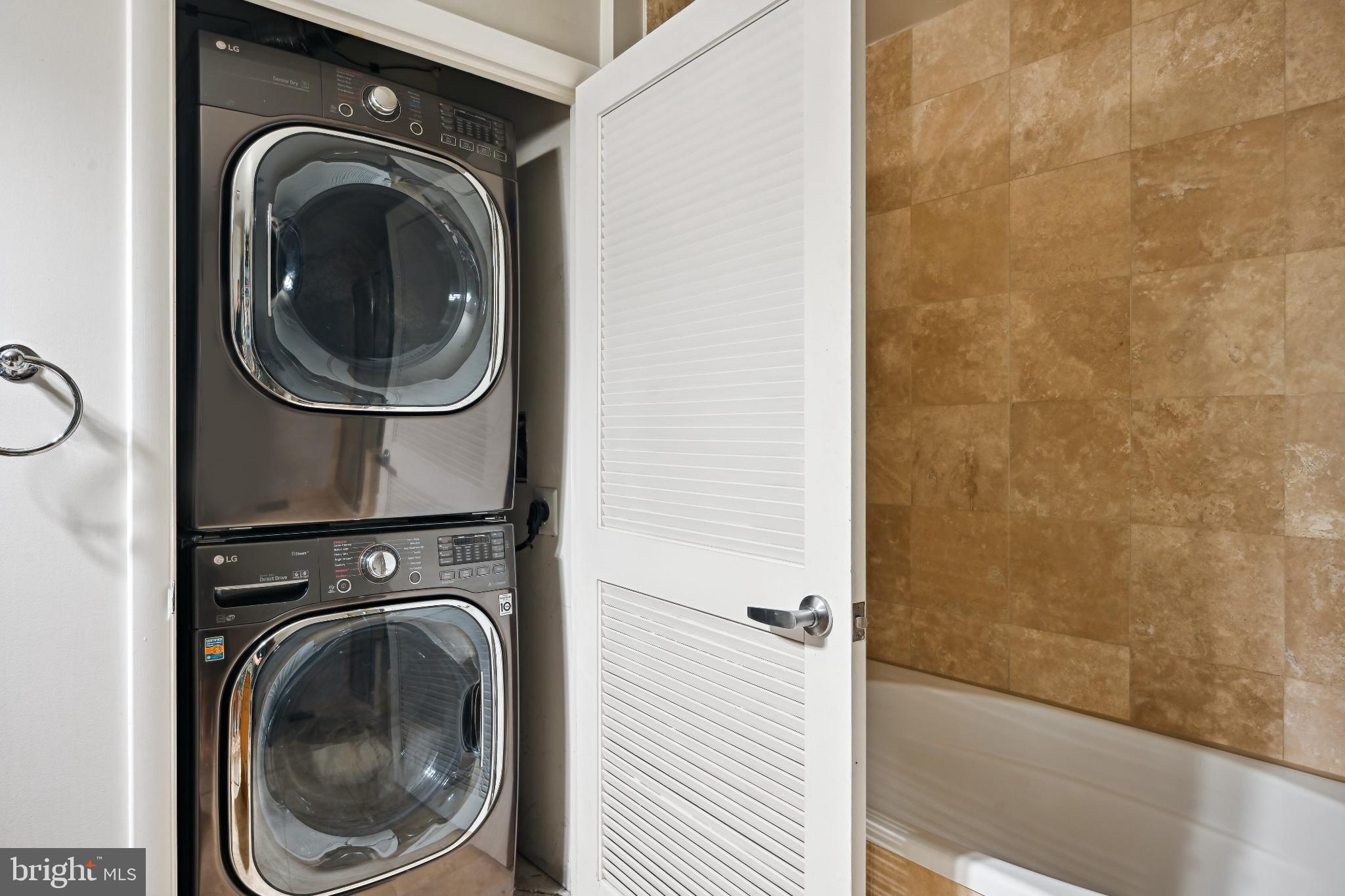1700 Kalorama Road Northwest, Unit 207 Washington, DC 20009 - Photo 21 of 40 a utility room with dryer and washer