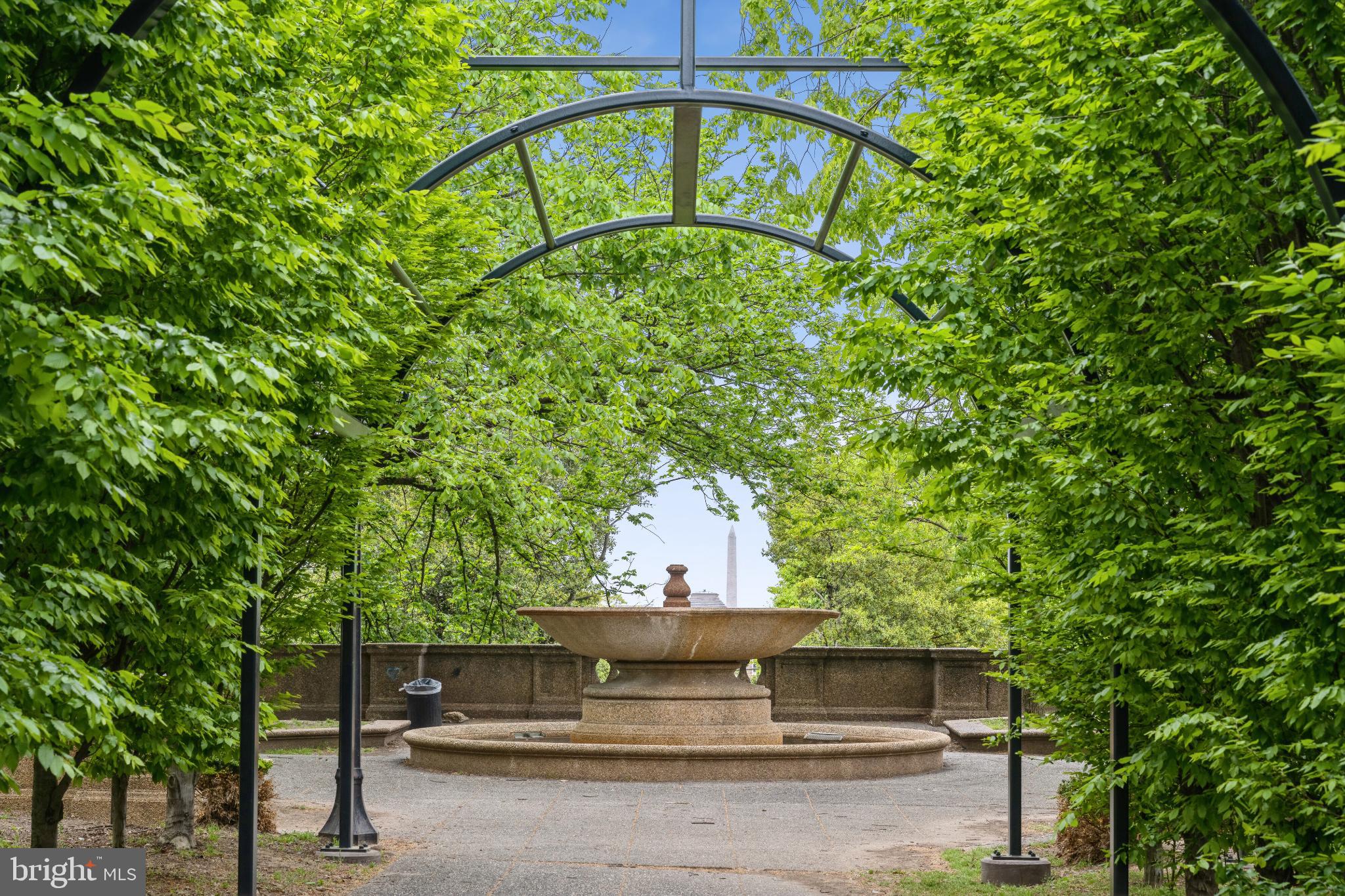 1700 Kalorama Road Northwest, Unit 207 Washington, DC 20009 - Photo 36 of 40 a view of a bench in a yard