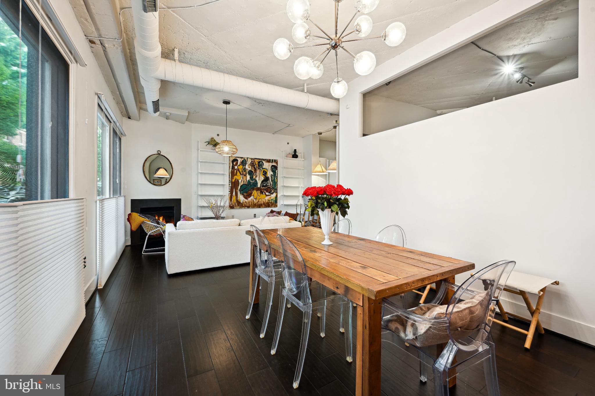 1700 Kalorama Road Northwest, Unit 207 Washington, DC 20009 - Photo 4 of 40 a view of a dining room with furniture and wooden floor