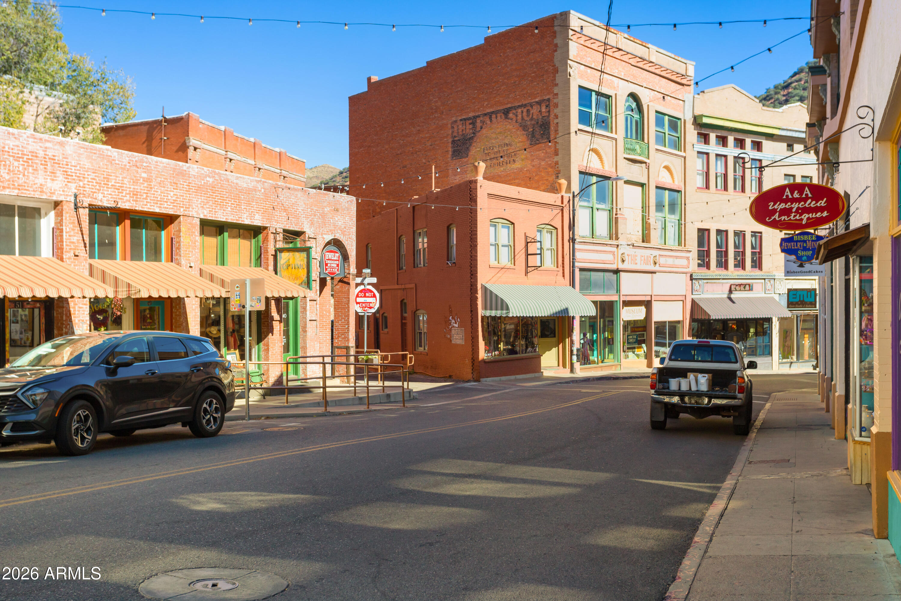 41 Main Street Bisbee, AZ 85603 - Photo 6 of 33 a car parked in front of a building