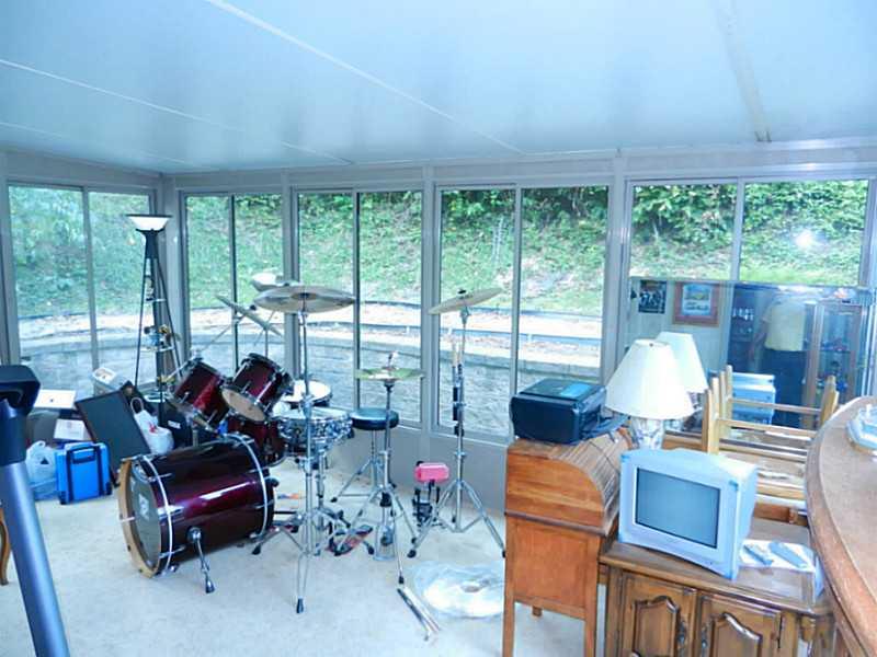 548 A Service Creek Road Aliquippa, PA 15001 - Photo 15 of 23 Sunroom.