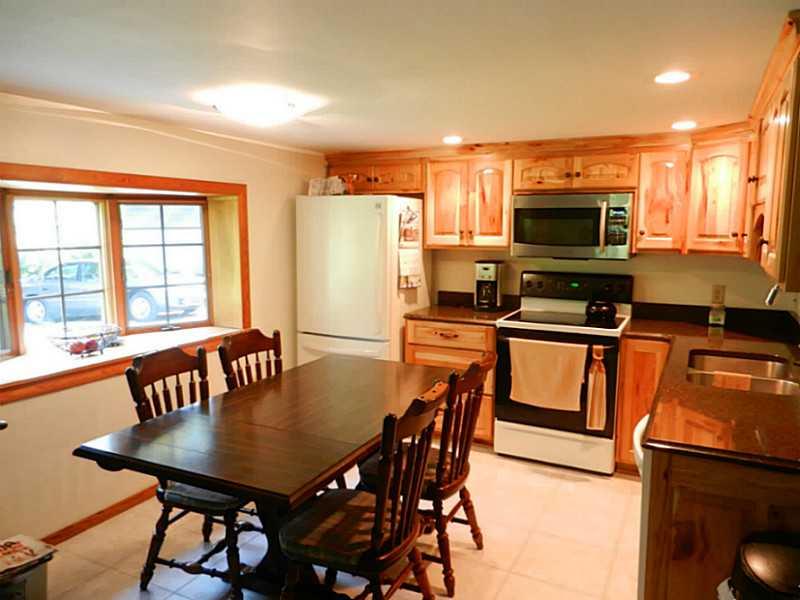 548 A Service Creek Road Aliquippa, PA 15001 - Photo 4 of 23 Kitchen. Amish built hickory cabinets with quartz countertops.