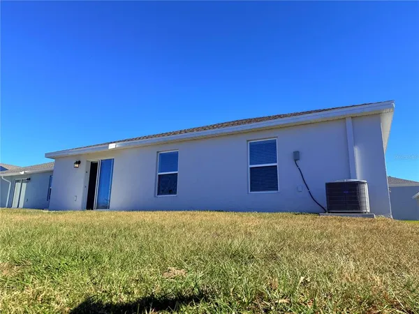 a front view of house with yard