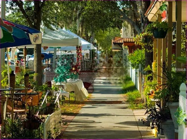 a view of street with sitting area