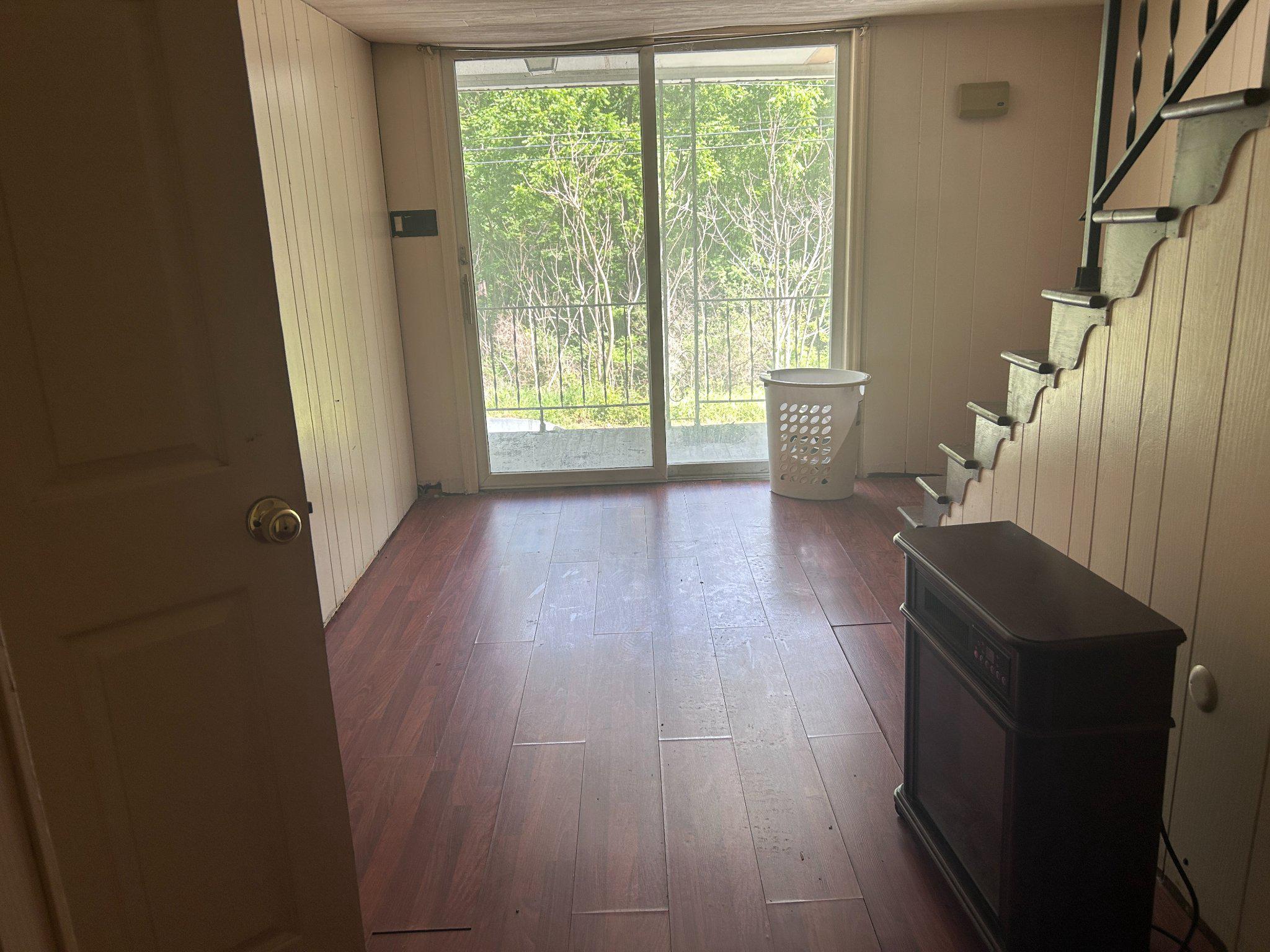 17738 Amberson Road Spring Run, PA 17262 - Photo 16 of 23 a living room with furniture and a gate