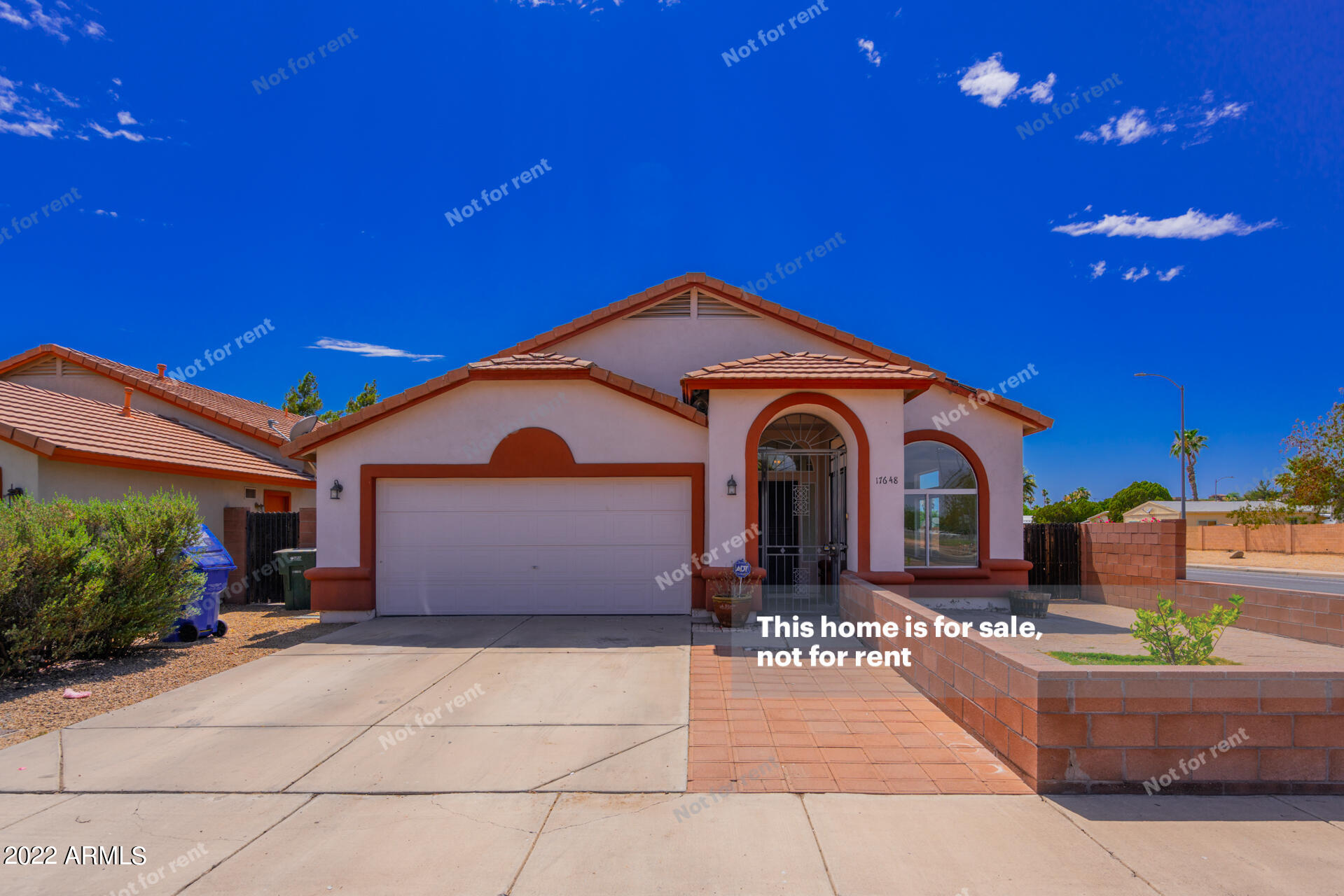 17648 North 17th Street Phoenix, AZ 85022 - Photo 1 of 31 a front view of a house with yard