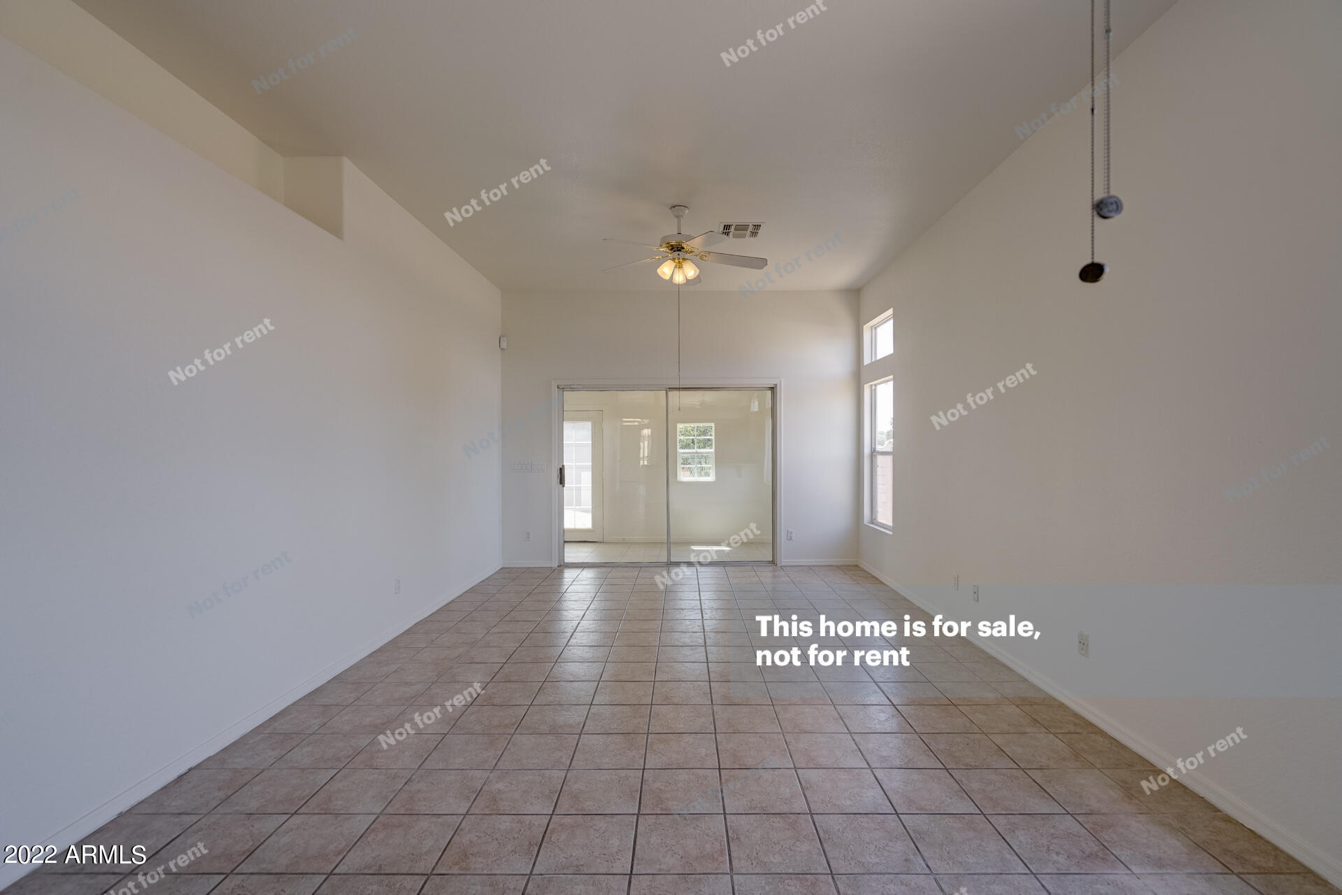 17648 North 17th Street Phoenix, AZ 85022 - Photo 13 of 31 a view of an empty room with a window
