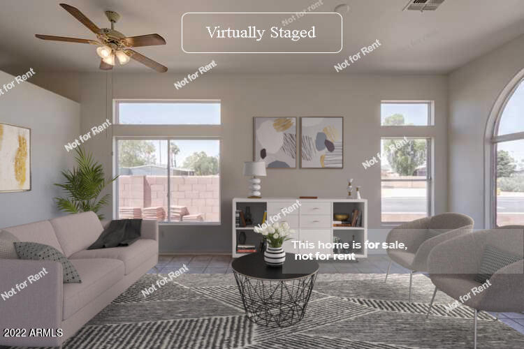 17648 North 17th Street Phoenix, AZ 85022 - Photo 2 of 31 a living room with furniture large window and flat screen tv