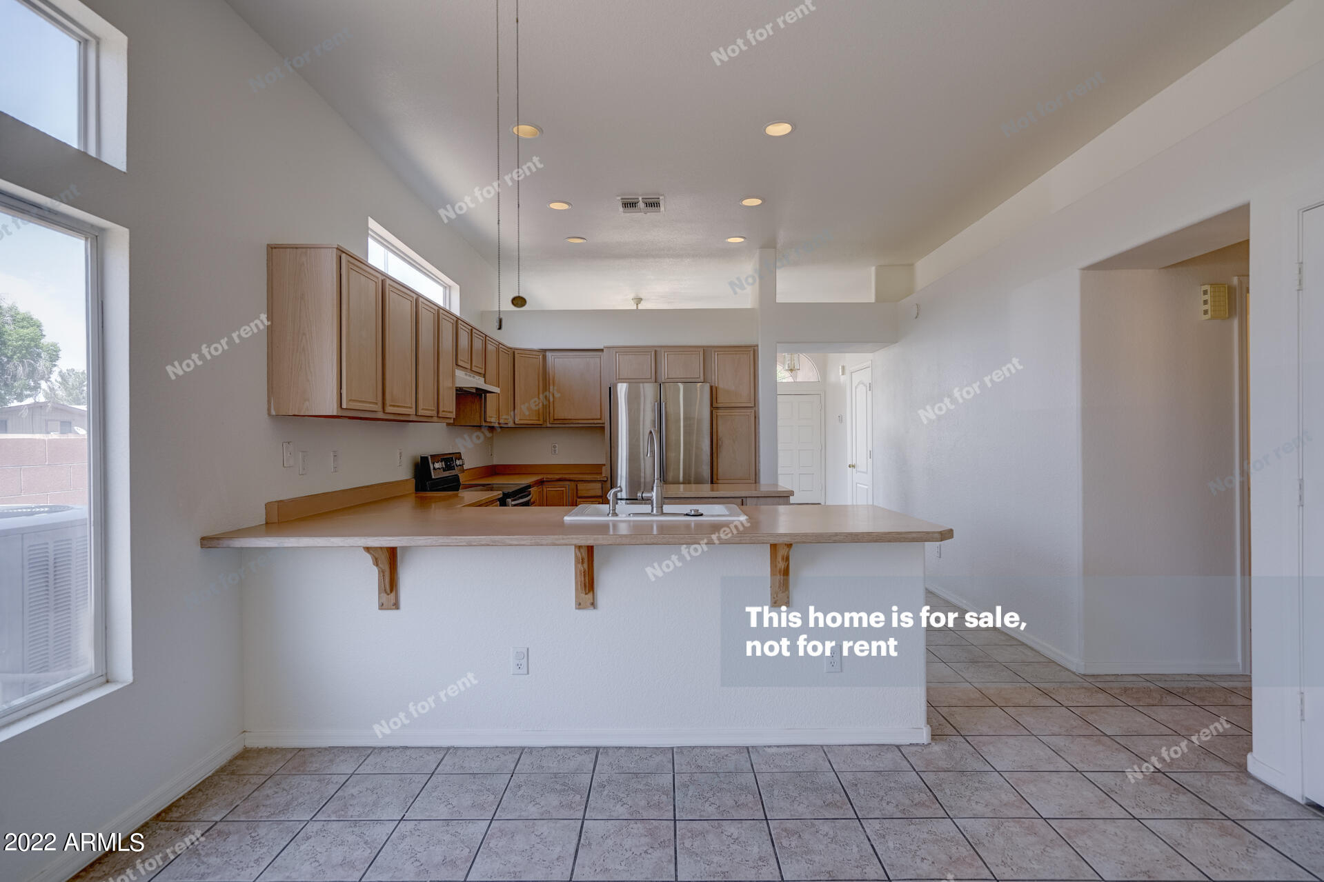 17648 North 17th Street Phoenix, AZ 85022 - Photo 4 of 31 a view of a kitchen with kitchen countertops and chandelier