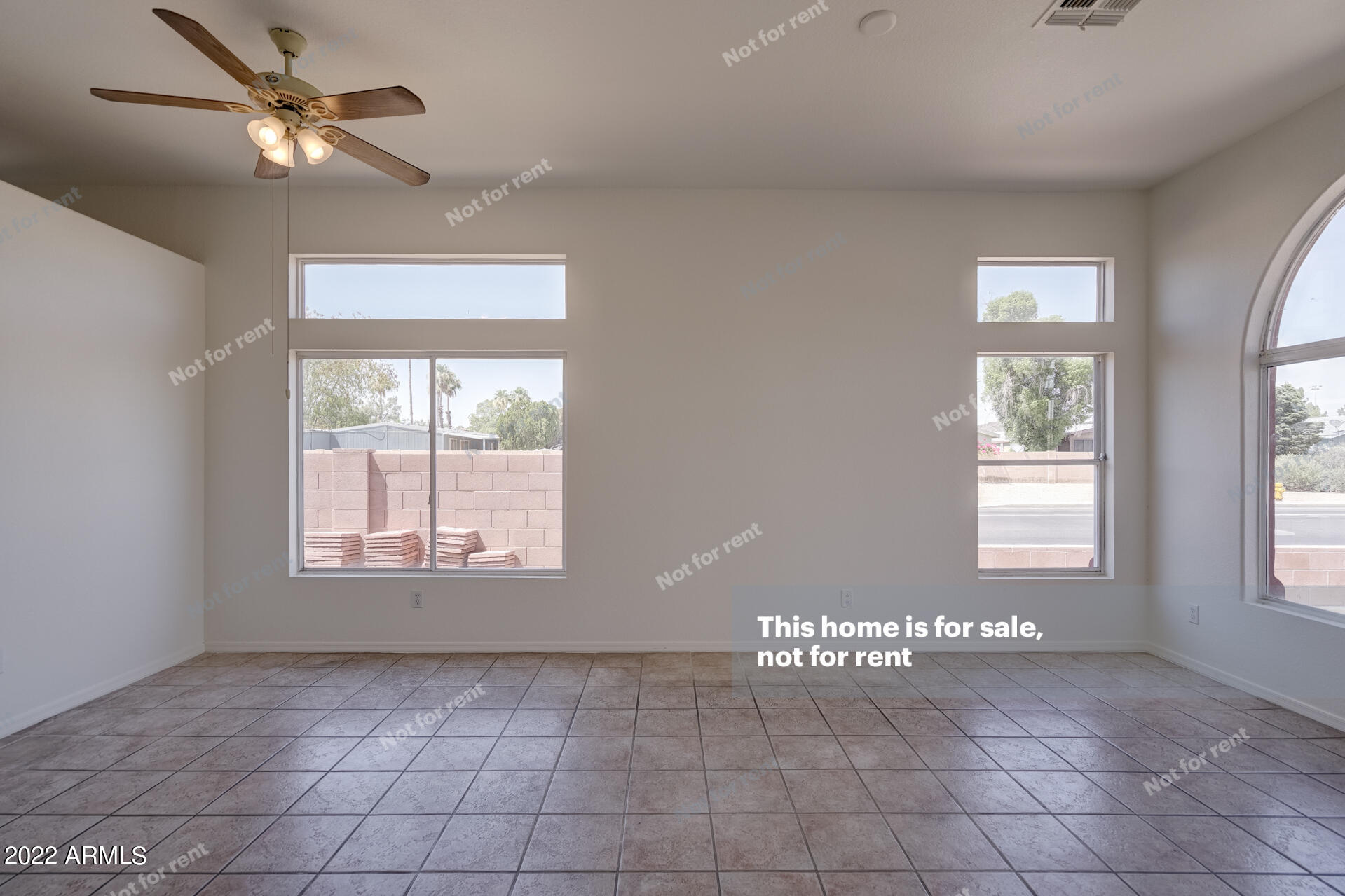 17648 North 17th Street Phoenix, AZ 85022 - Photo 5 of 31 a view of an empty room and window