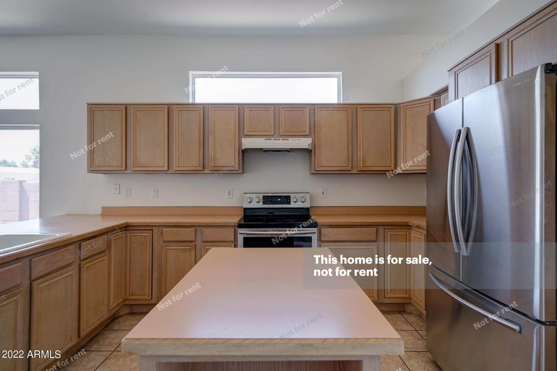 17648 North 17th Street Phoenix, AZ 85022 - Photo 9 of 31 a kitchen with stainless steel appliances granite countertop a refrigerator stove and sink
